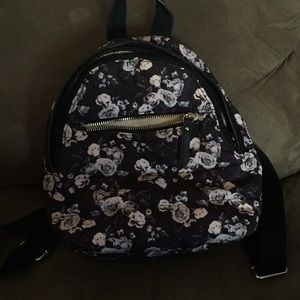 Black and white floral Madden Girl mini backpack